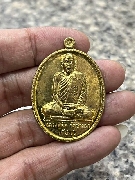 เหรียญรูปไข่เต็มองค์รุ่นแรก ฉลองสมณศักดิ์ อายุ 75ปี หลวงพ่อตัด วัดชายนา ปี49
